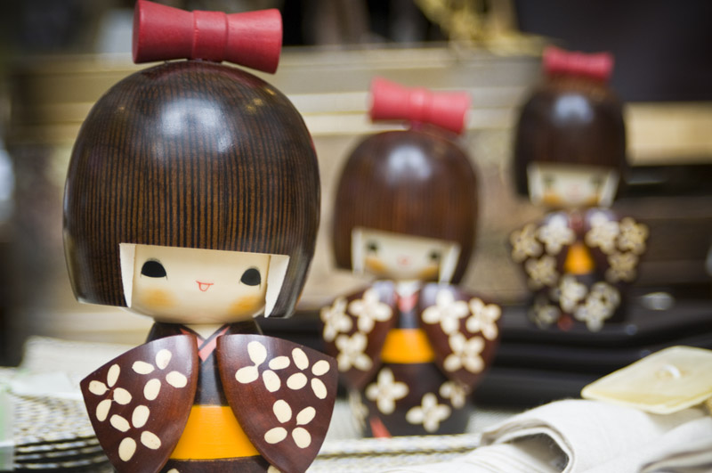 Close up photo of Kokeshi Dolls
