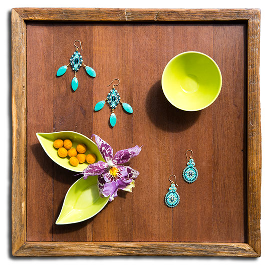Tray with two pair of Miguel Ases earrings.